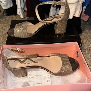 silver/goldish heels worn once maybe twice